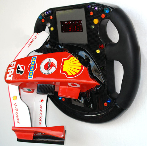 Gadget of the Day - Ferrari F1 Car crashing out of F1 Steering Wall Clock