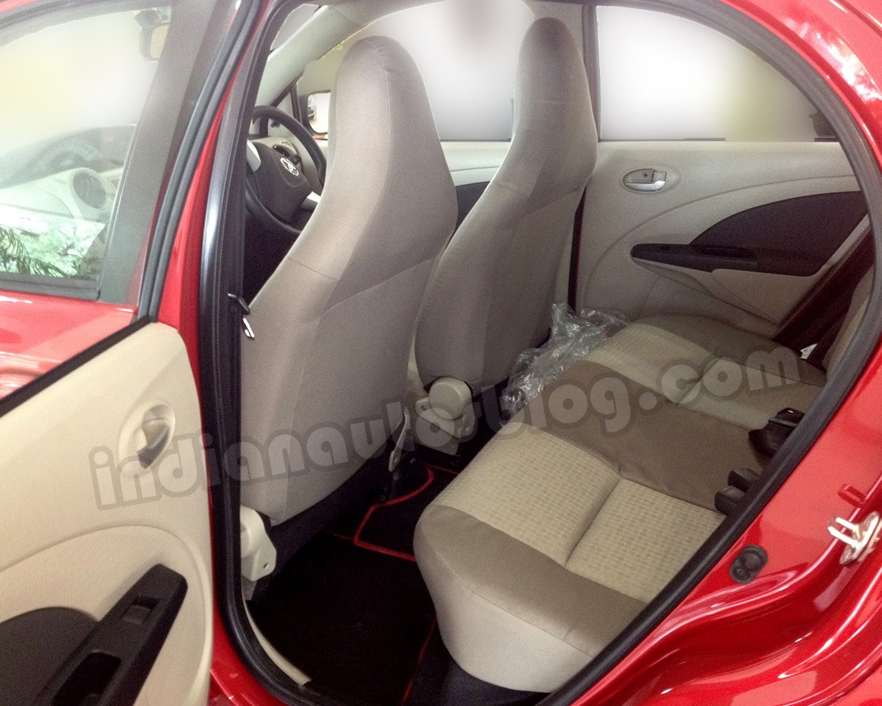 A Closer Look At The Beige Interior On The Toyota Etios Liva