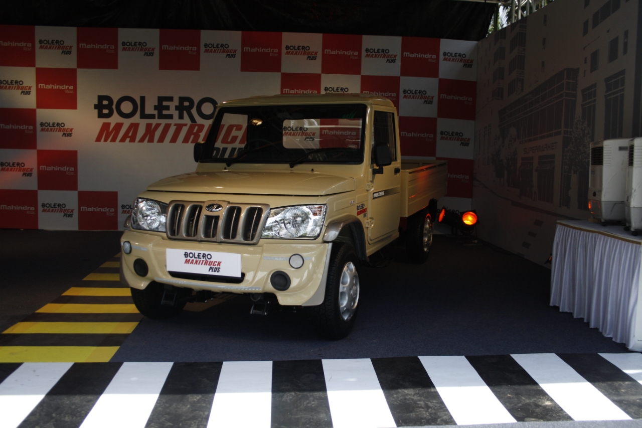 Mahindra Bolero Maxi Truck Plus beige front quarter
