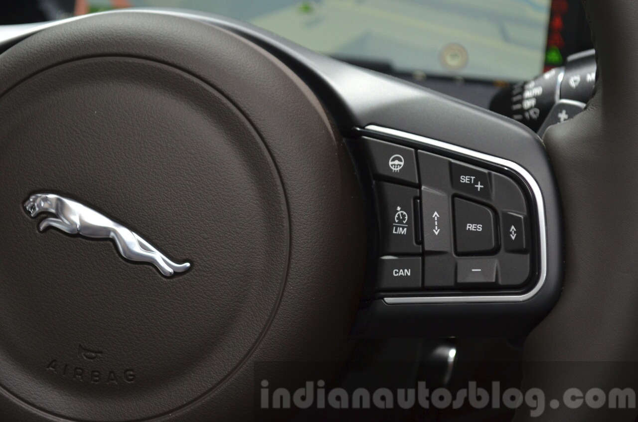 2016 Jaguar XF cruise controls buttons on the steering wheel at the IAA