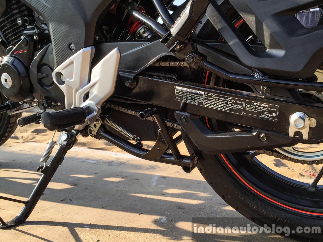 Honda CB 160R orange with stickering centre stand launched