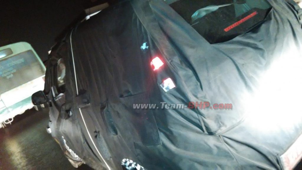Mahindra Reva e2o 4-door version rear quarter spied