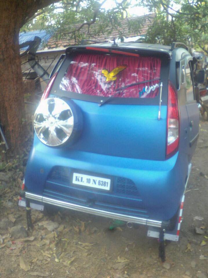 3-wheeled Auto Rickshaw modded with Tata Nano doors