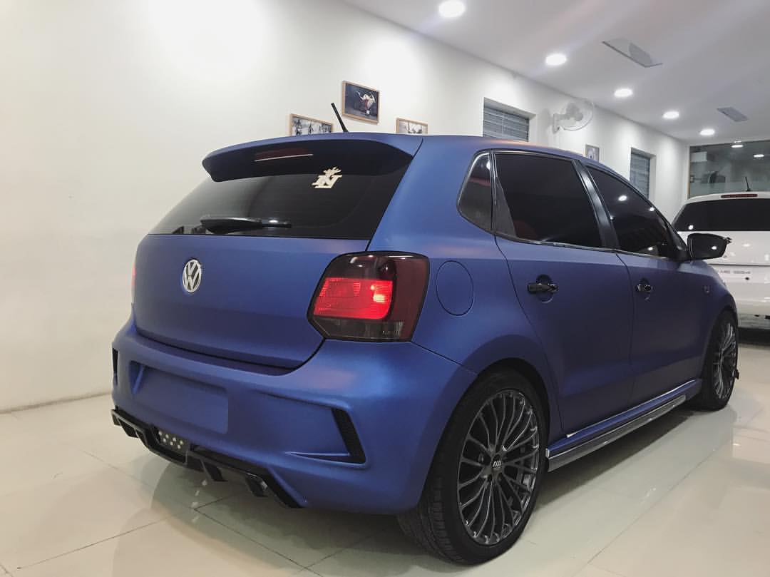 VW Polo with sports body kit and matte blue wrap - In Images