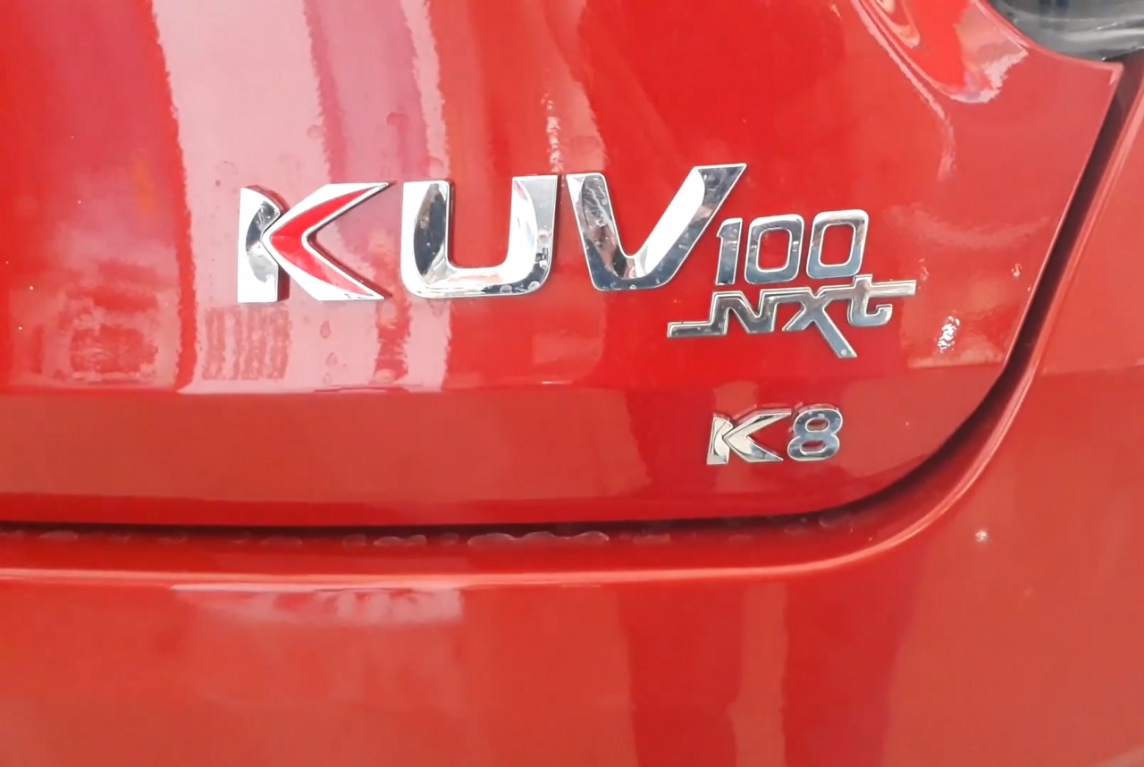 Mahindra KUV100 NXT boot lid badge