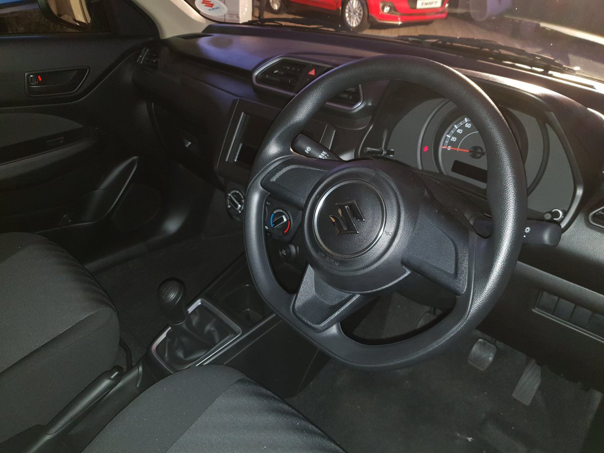 Maruti Dzire with body kit dashboard