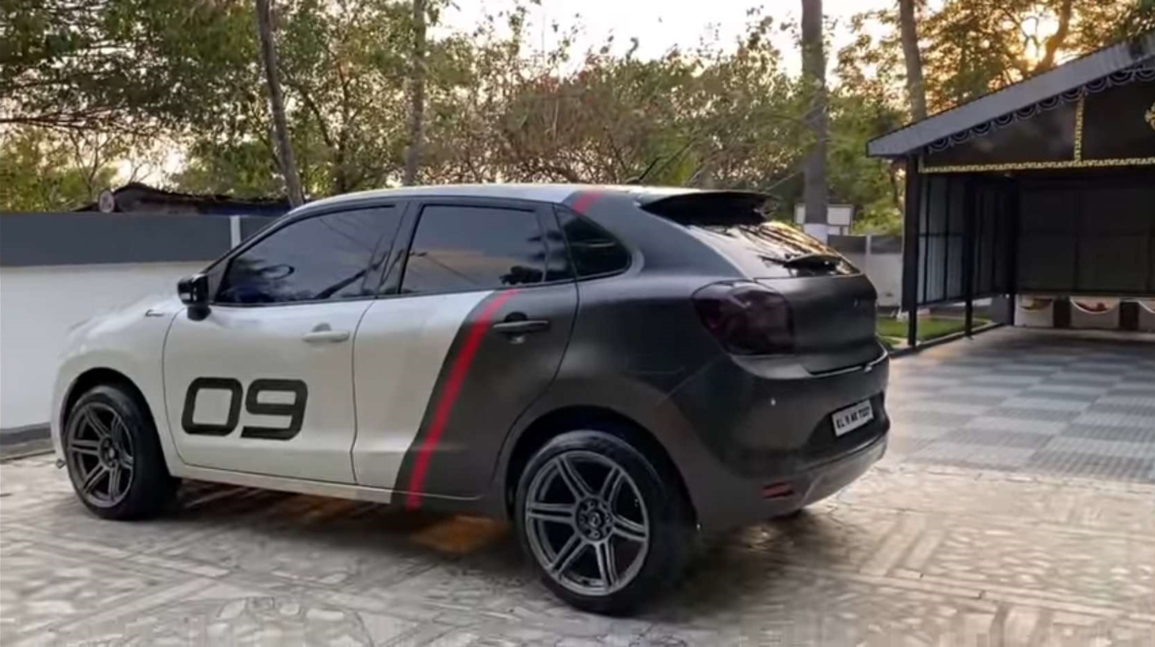 This modified Maruti Baleno  has one of the coolest wraps 