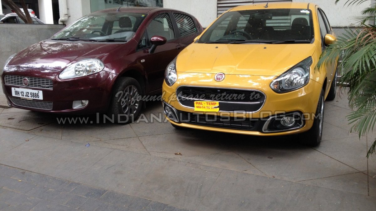 Fiat Punto Evo (facelift) poses alongside its predecessor