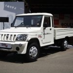 Mahindra Bolero Maxi Truck Plus white front quarter left