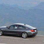 rear left three quarter angle of the grey 2014 BMW 4 Series Coupe