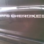 2014 Jeep Grand Cherokee spied in India badge