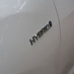 Toyota Camry Hybrid badge on the fender