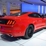 2015 Ford Mustang GT red rear three quarters at NAIAS 2014