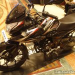 Bajaj Discover 150 F Launch black and red front three quarter left