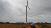 2013 Nissan Micra by a windmill