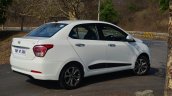 Hyundai Xcent Review rear quarter white