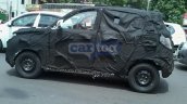 Mahindra S101 spied with Quanto side