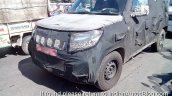 Mahindra U301 front three quarters spied testing in Chennai October 2014
