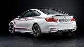 2015 BMW M4 with M Performance accessories rear three quarter