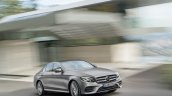 2016 Mercedes E-Class E 400 4MATIC front three quarters in motion selenit grey magno