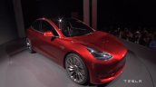Tesla Model 3 front three quarters red