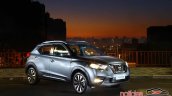 Nissan Kicks official image front three quarters right side standstill night view