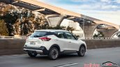Nissan Kicks official image rear three quarters in motion