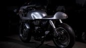 Royal Enfield Continental GT Silver Bullet by white collar bike rear left quarter