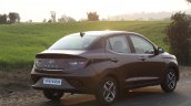 Hyundai Aura Review Images Rear Three Quarters 3 E