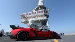 Lamborghini world premieres Veneno Roadster on an aircraft carrier