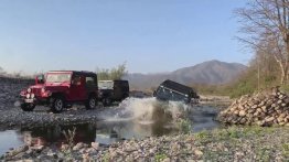 Watch New Mahindra Thar Easily Wade Thru Deep Puddle Sans Snorkel