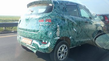 Mahindra XUV100 (S101) with Chevy Beat-like door handles - Spied