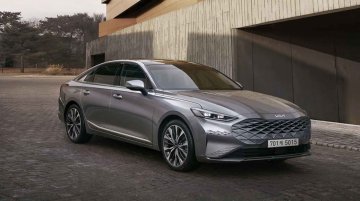 Kia K8 Flagship Sedan Debuts Brand's New Logo And Striking New Design Language