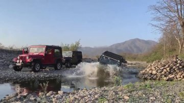 Watch New Mahindra Thar Easily Wade Thru Deep Puddle Sans Snorkel