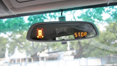 Mahindra Quanto reversing on the inside rear view mirror