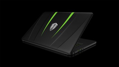 Koenigsegg and Razer Blade Laptop front quarter