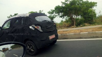 Mahindra S101 caught testing in India side view shot