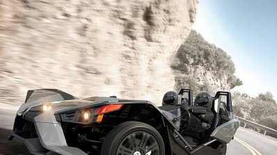 Polaris Slingshot three wheeler press shot on the move