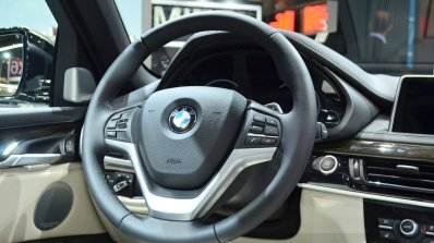 2015 BMW X6 steering wheel at the 2014 Paris Motor Show