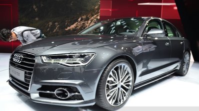 Audi A6 facelift front three quarters right view at the 2014 Paris Motor Show