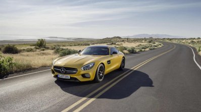 Mercedes AMG GT press image yellow front three quarter