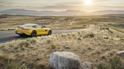 Mercedes AMG GT press image yellow rear three quarter