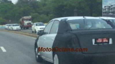 VW Vento facelift rear three quarter camouflaged test mule