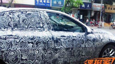 BMW 1 Series sedan side spyshots from China