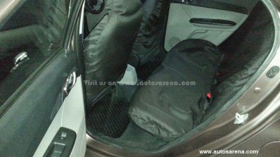 Tata Zica interior rear snapped uncovered