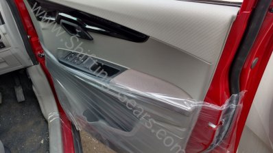 Mahindra KUV100 front inside door panel spied