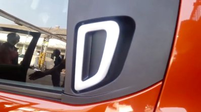 Mahindra KUV100 rear door handle spied upclose