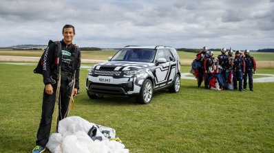 2017 Land Rover Discovery front three quarters with Bear Grylls