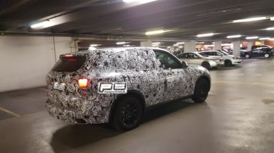 2018 BMW X5 rear three quarters right side spy shot