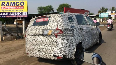 Mahindra U321 MPV rear three quarters right side spy shot